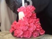 13th cake pink flower covering