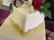 2 tier white gold trim cake