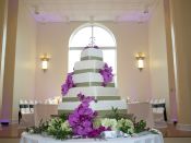 5 tier wedding cake purple flowers with background